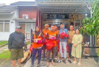 Banyuke Family melaksanakan bakti sosial berbagi kasih bersama masyarakat sambut natal dan tahun Baru 2026, di Citra Maja Lebak, Banten 1/1/2026. 